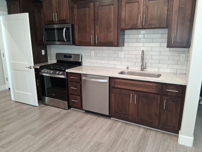 Photo - Spacious 5BR Home with Private In-Law Unit, Loft & Modern Upgrades!