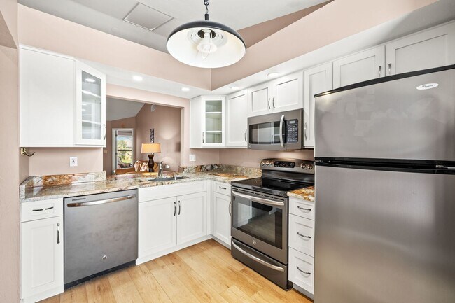 Photo - Furnished Gulf Access Canal View Boat Lift...