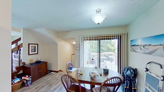 Photo - 2 BR, 1.5 BA Clive split level duplex. Deck and one car attached garage.