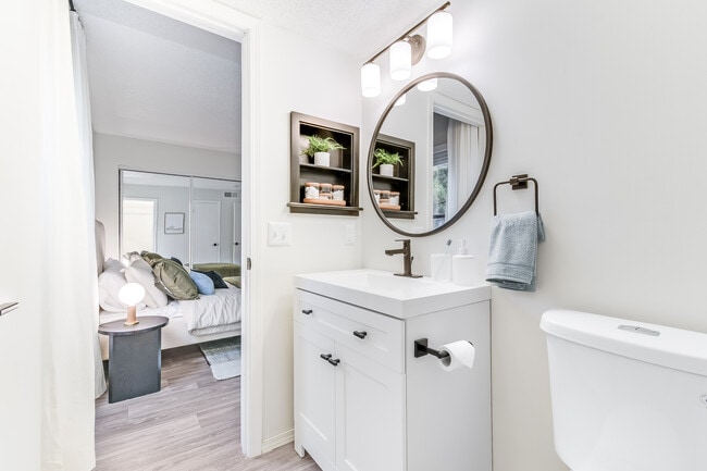 Bathroom with Designer Mirror and Modern Light Fixture- Diamond Interior