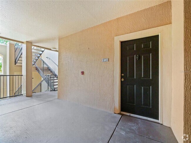 Building Photo - 5536 Metrowest Blvd Unit 8-212 Rental