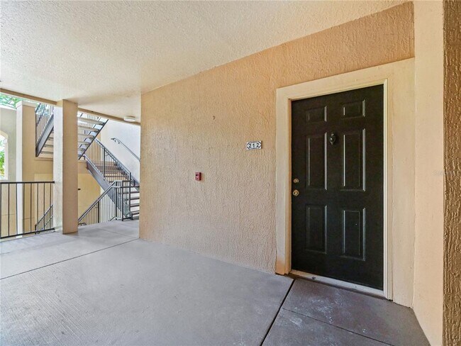 Building Photo - 5536 Metrowest Blvd Unit 8-212 Rental