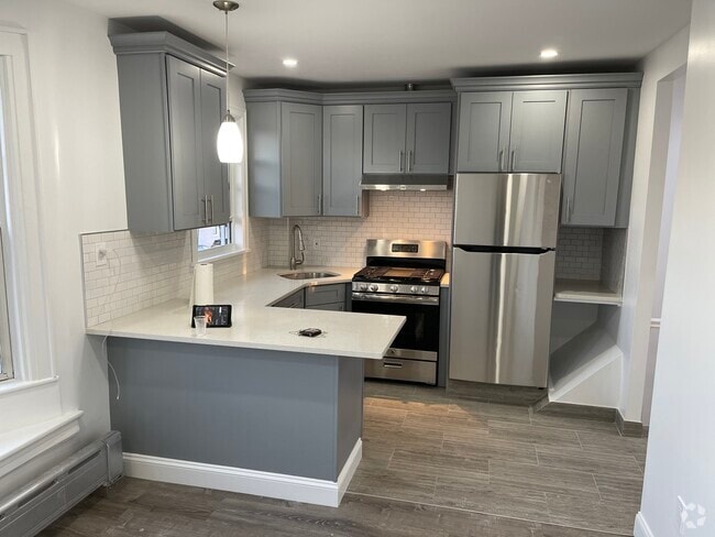 Building Photo - 7856 76th St Unit 2fl Rental
