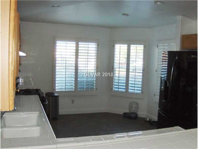 Photo - 1 story home with 2 car garage in a gated community