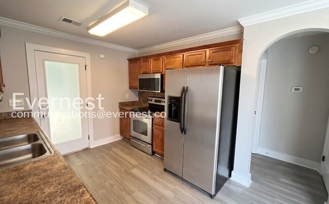 Photo - 3-Bed/2-Bath Home with Fenced Yard and Deck/ Pet-Friendly/ Section 8 Accepted/Available Now!