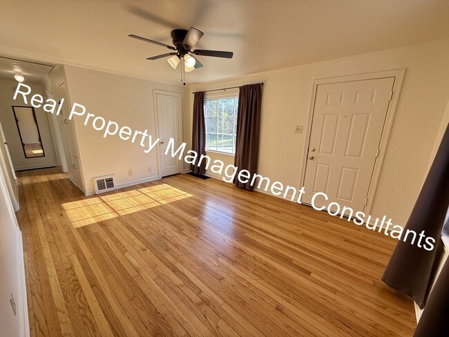 Photo - Charming 3-Bedroom Home with Covered Deck ...