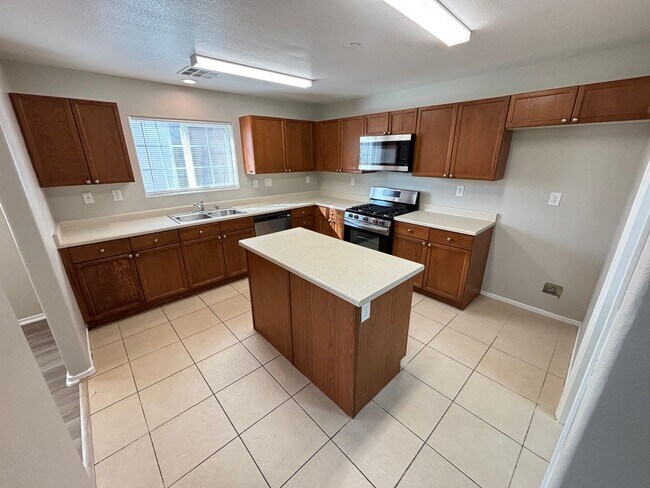 Photo - Spacious Tri-Level 4-Bedroom Home with Bal...