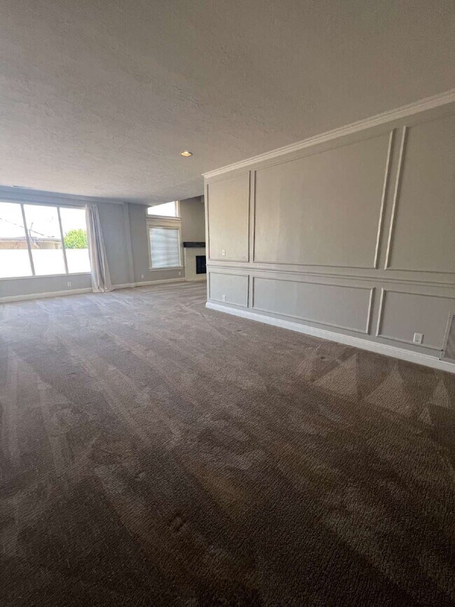 Photo - "Spacious 4-Bed Oasis with 3.5 Baths in Charming St. George!"