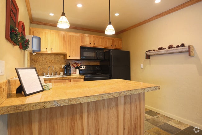 Community Room-Kitchen - Village Inn Apartments