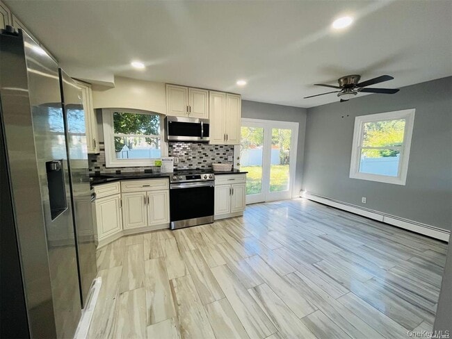 Photo - 200 Hicksville Rd Townhome