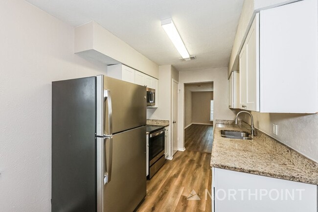 Photo - 4 BR/2BA | Newly Renovated Single Family Home | Covered Patio  | Fenced backyard!