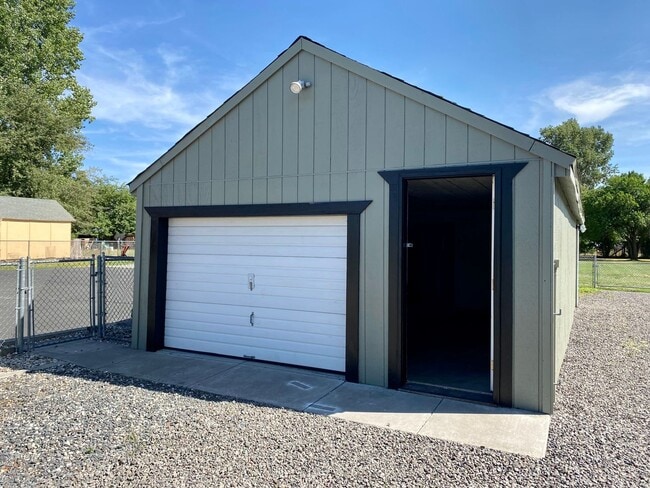 Photo - Charming 2bdrm, 1.bath house with garage, workshop space and large yard