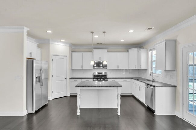 Photo - 4BR/3BA Luxury Home with Bonus Room, Screened Porch & Fenced Yard $2,600/mo rent