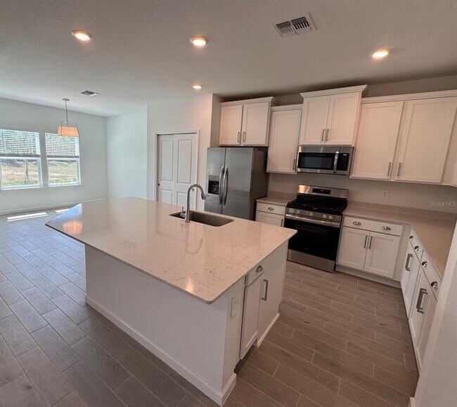 Photo - 13717 NW Convergence Blvd