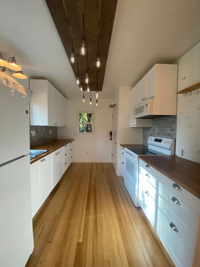 Photo - Perry District Gem – Move-In Ready 3 plus Bed / 2 Bath Brick Home with Finished Basement & 2-Car ...