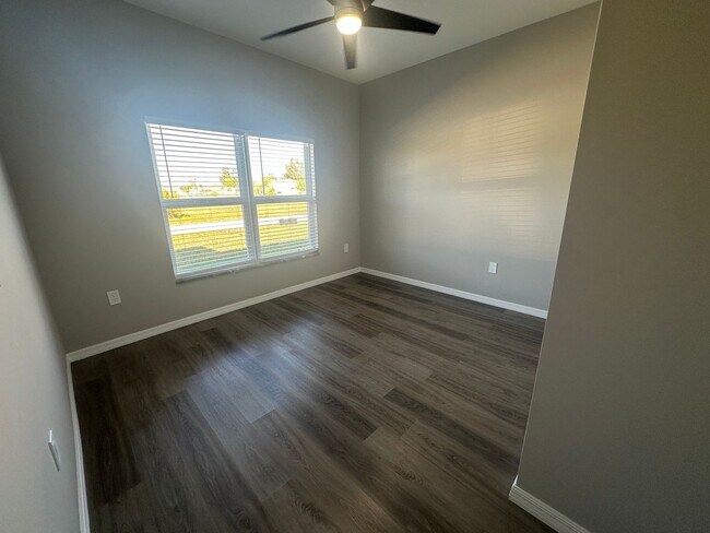 Photo - AVAILABLE MID APRIL- 4 Bedroom 2 bathroom 3 Car Garage NE Cape Coral Home with Screened Lania