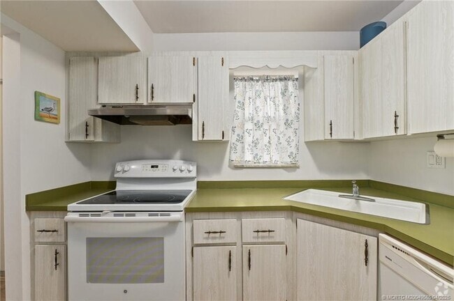 Building Photo - 1931 SW Palm City Rd Unit 16D Rental