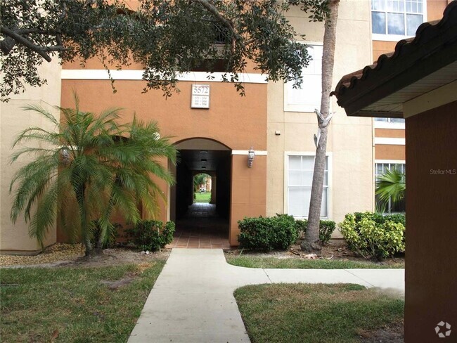 Building Photo - 5572 Metrowest Blvd Unit 5-104 Rental