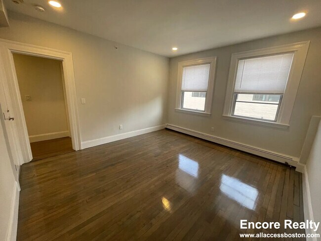 Building Photo - 457 Centre St Unit 210