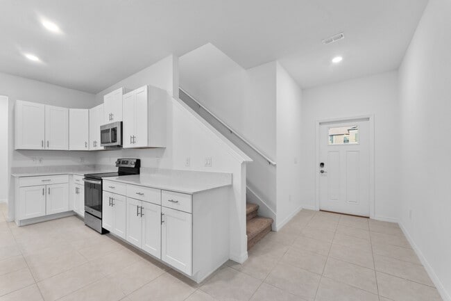 Photo - Absolutely stunning 3 BR /2.5 Bath / 2 Car Garage + LOFT townhome in ultra-modern and green-focus...