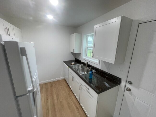 Photo - 309 W 7th St Unit New construction