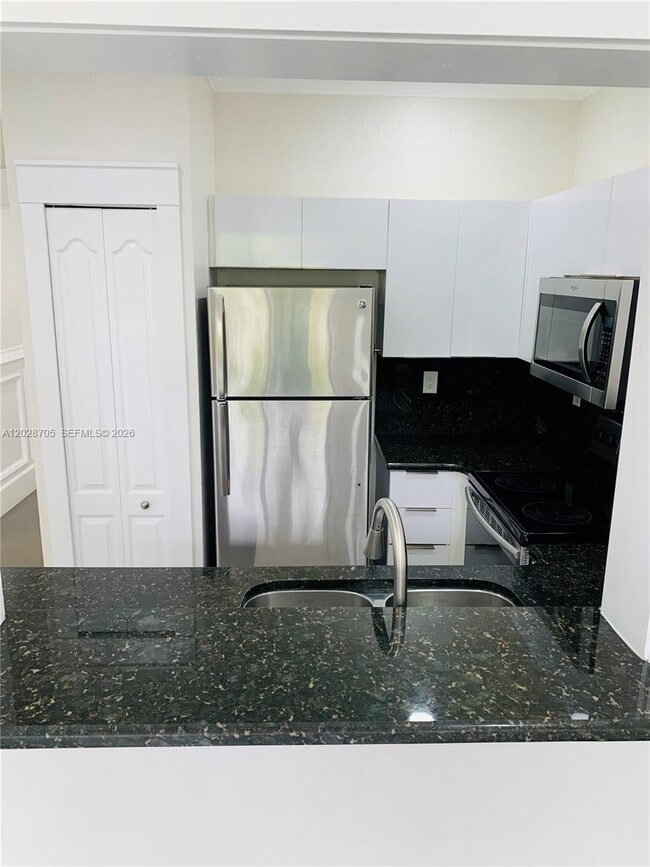 Building Photo - 17650 NW 73rd Ave Unit 202