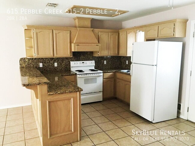 Building Photo - 615 S Pebble Creek Unit 2,