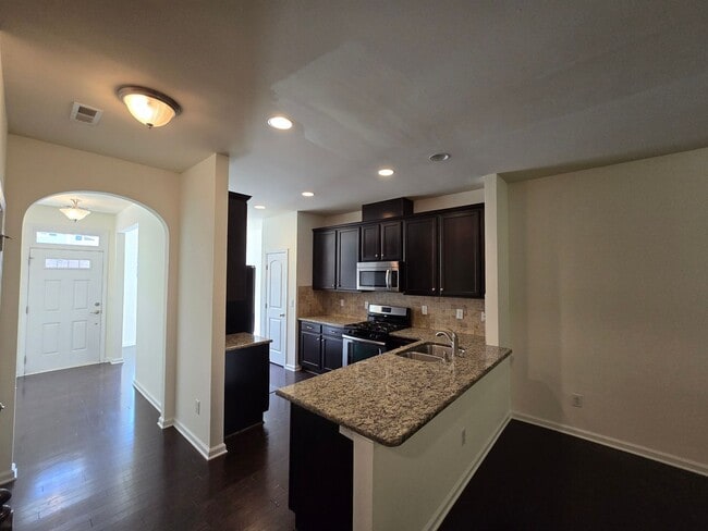 Photo - Spacious 3BR, 2.5BA Townhome with Loft & H...