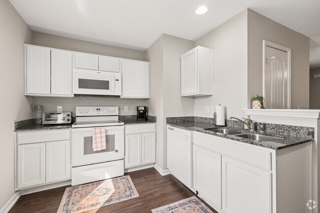 2BR, 2.5BA - 832SF - Kitchen