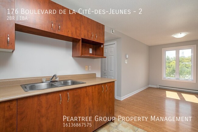 Photo - Charming 2 Bedroom End Unit Condo Unit 2