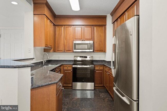 Building Photo - 3101 N Hampton Dr Unit 1614