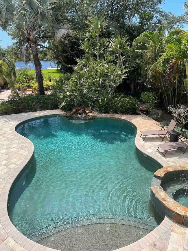 Photo - 4 Bed/2 Bath Waterfront Paradise with Pool, Dock & Gulf Access in Baileys Bluff