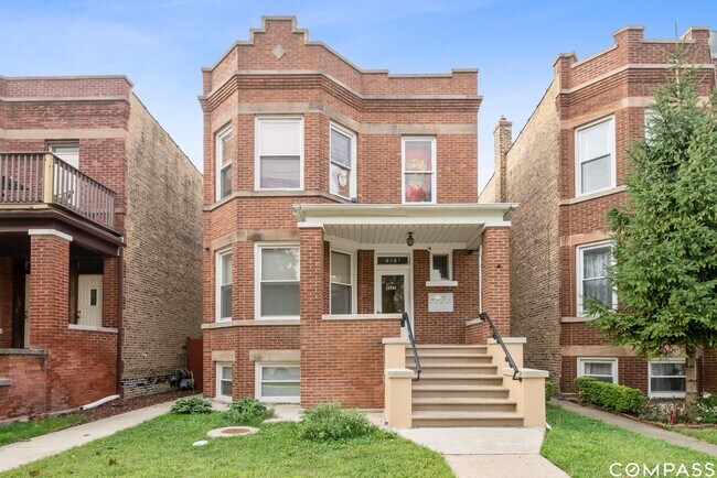 Building Photo - 4247 W Melrose St Unit 1