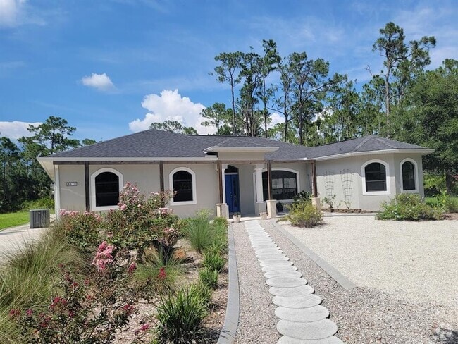 Building Photo - 8570 Tropicaire Blvd Rental