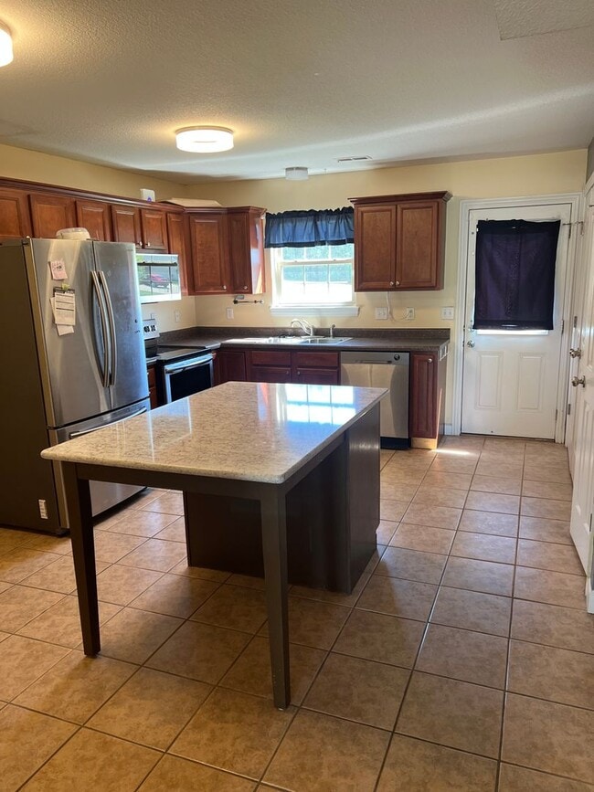 Photo - 4 bedroom, 2 bathroom, car garage townhouse