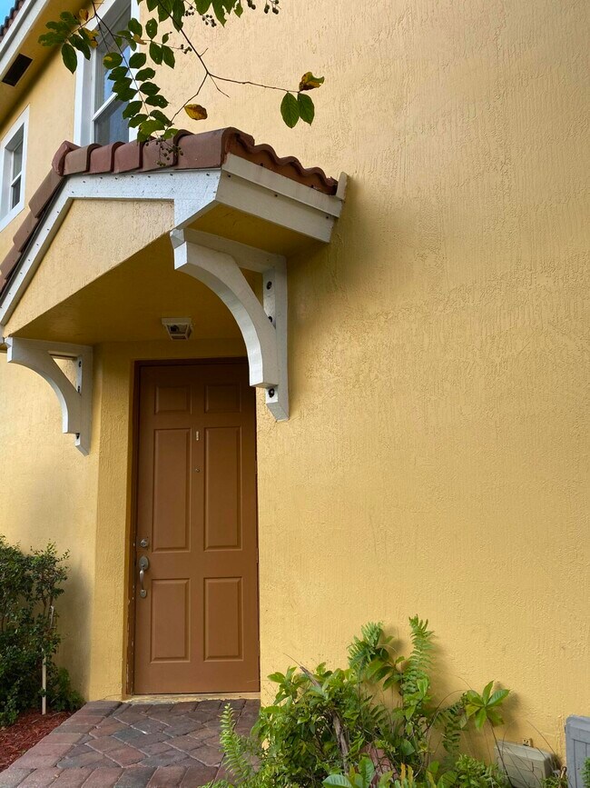 991 Pipers Cay Dr Townhome For Rent in West Palm Beach, FL