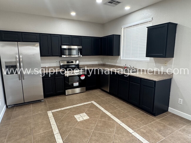 Photo - 1909 N 103rd Ln