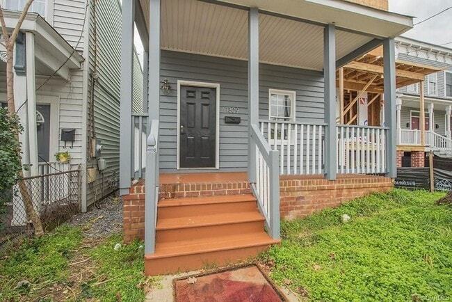 Photo - Newly Renovated 4 Bedroom | 4 Bath With Private Parking | Upper and Lower Covered Porches!