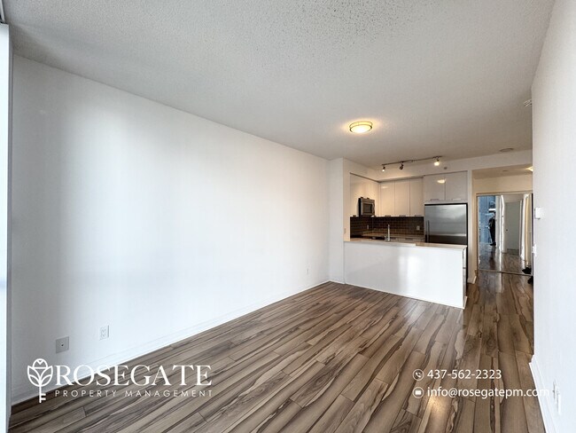 Photo - Modern 1 Bedroom + Den Condo with Balcony & Parking in Prime Mississauga Unit 1310