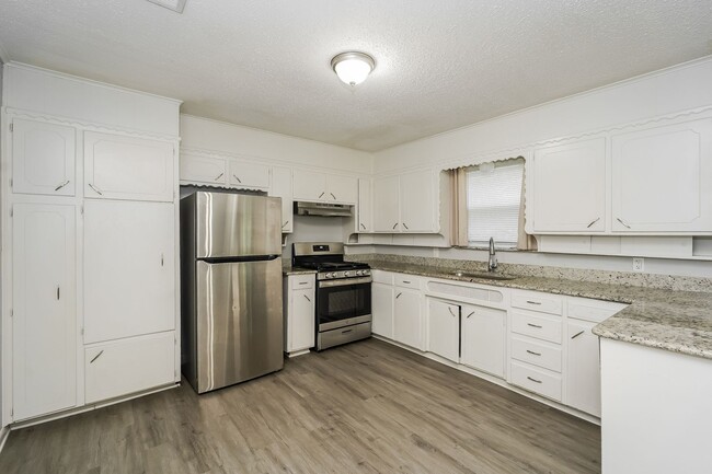 Photo - Newly Renovated Single Family Home | 4 BR/2BA | Car Covered Parking | With 2 living areas