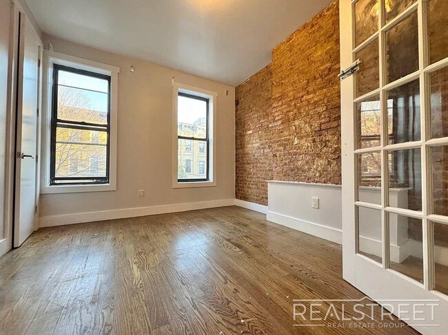 Photo - True 3 Bedroom layout — no flex, no railroad - Massive full-floor basement with second private entra Unit 2L