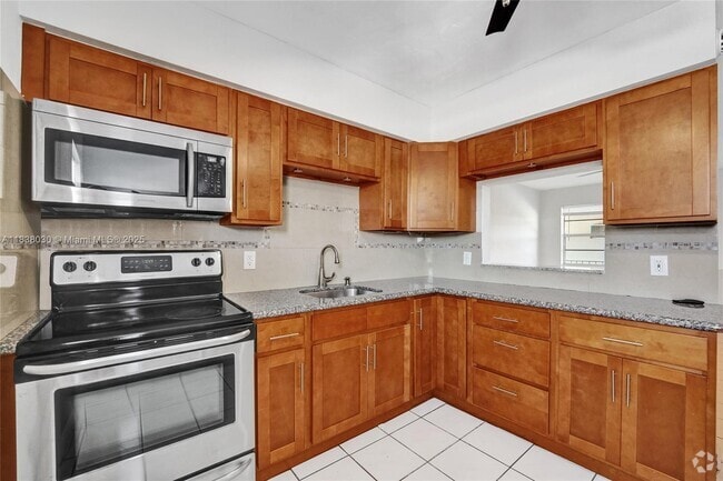Building Photo - 7401 Pines Blvd Unit 210 Rental