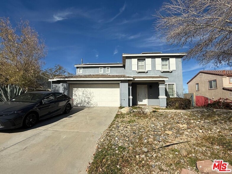 719 E Ave Q10