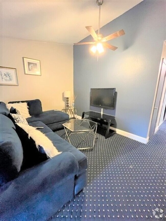 Building Photo - Unique Opportunity - Furnished Apartment w...