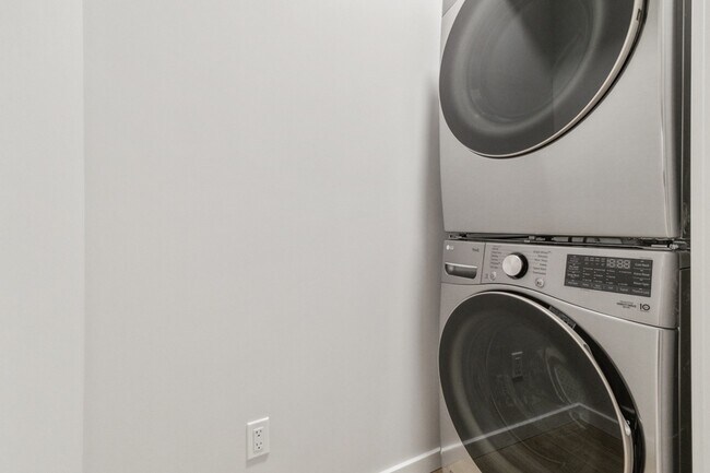 Photo - 21003-21025 25 Ave NW