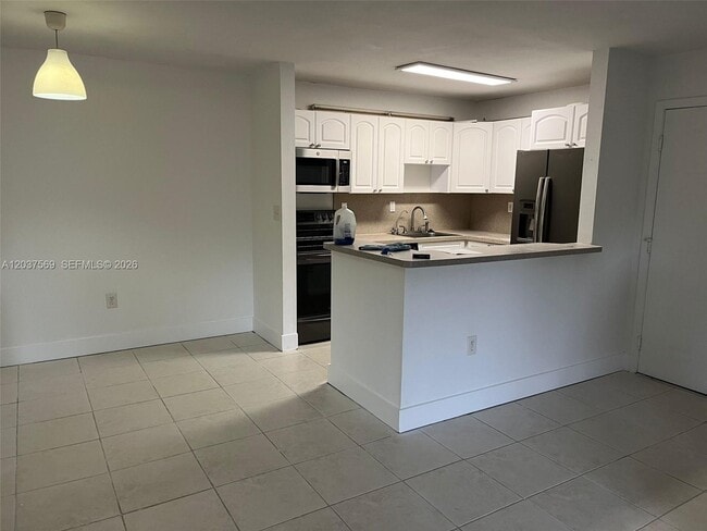 Building Photo - 4800 NW 102nd Ave Unit 103-10