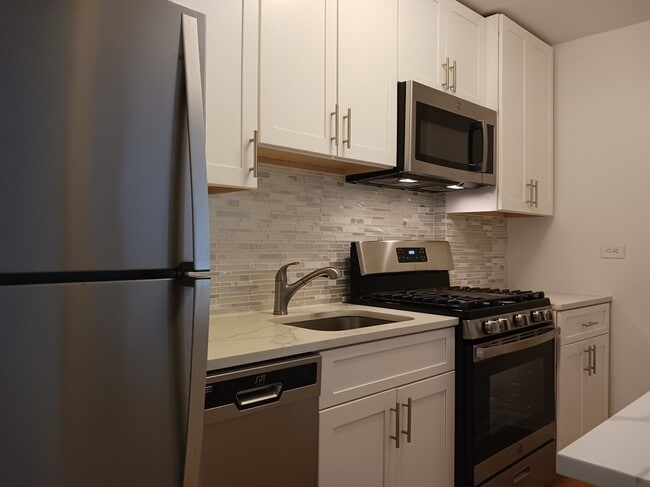 Building Photo - 1260 21st St NW Unit 300
