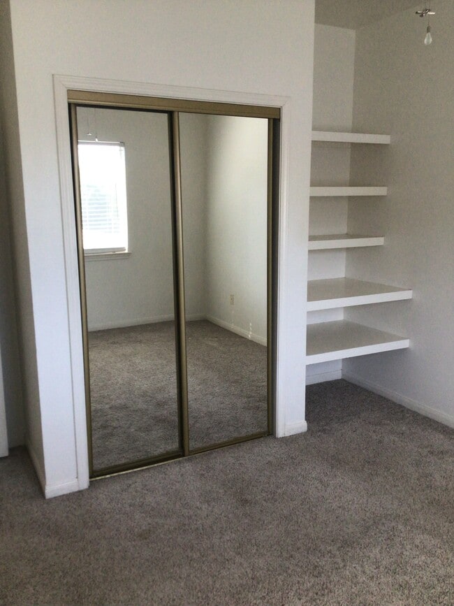 LARGE BEDROOM WITH BUILT IN SHELFS - 2913 Whisper Oaks Ln
