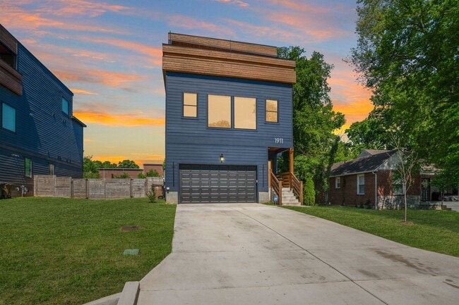 Building Photo - Luxury Nashville Retreat with Skyline & River Views | 4BR + Rooftop Entertainment Loft