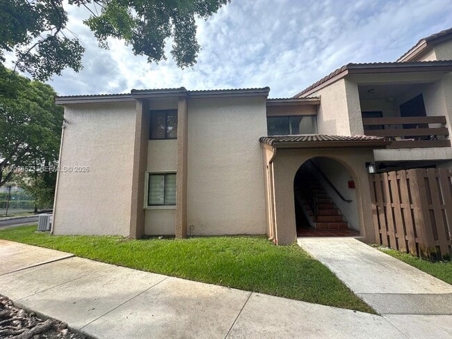 Building Photo - 8999 SW 123rd Ct Unit 212